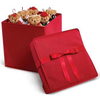 12 Days of Christmas Ornament Set - Red fabric box with satin ribbon has the cover off to the side and 6 light brown bears dressed in Christmas costumes are peeking out over the top. 