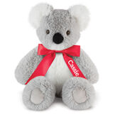 18" Oh So Soft Koala - Front view of seated 18" gray koala with white muzzle, ears and belly wearing a red satin bow with tails personalized with "Cassie" in white lettering image number 4