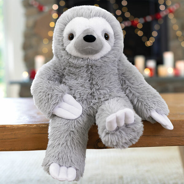 18" Oh So Soft Sloth - Front view of seated gray 18" Sloth presented as a Christmas gift