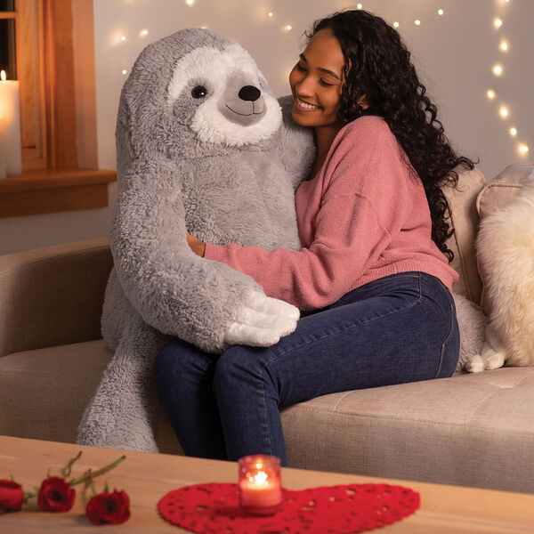 3 1/2' Gentle Giant Sloth - Front view of seated gray and white Sloth in Valentine's Day scene image number 0