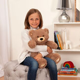 8" Oh So Soft Teddy Bear - Front view of seated honey brown bear in a bedroom scene being held by a girl image number 6