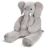 6' Giant Cuddle Elephant - 3/4 view of seated grey plush elephant with white fabric tusks, floppy ears and long trunk image number 7
