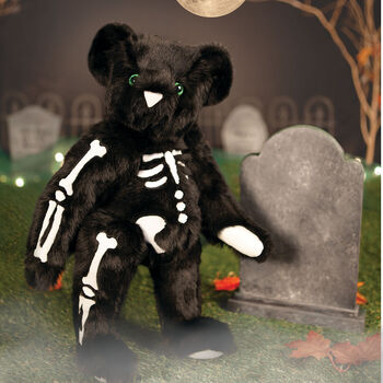 15" Skeleton Bear -  Standing front view of jointed black bear with glow in the dark eyes and bones white nose and white pads. 