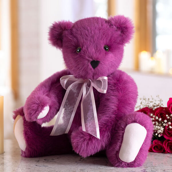 20" Special Edition La Vie En Rose Bear - Front view of jointed seated rose wine bear with pink organza bow around neck in living room scene image number 4