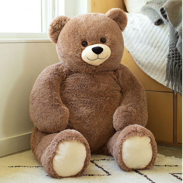 ' Cuddle Teddy Bear- Front view of seated mocha latte teddy bear in a bedroom scene image number 3