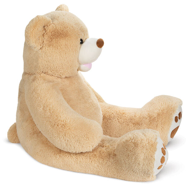 4' Bubba The Teddy Bear - Side view of tan bear with ivory muzzle and embroidered foot pads