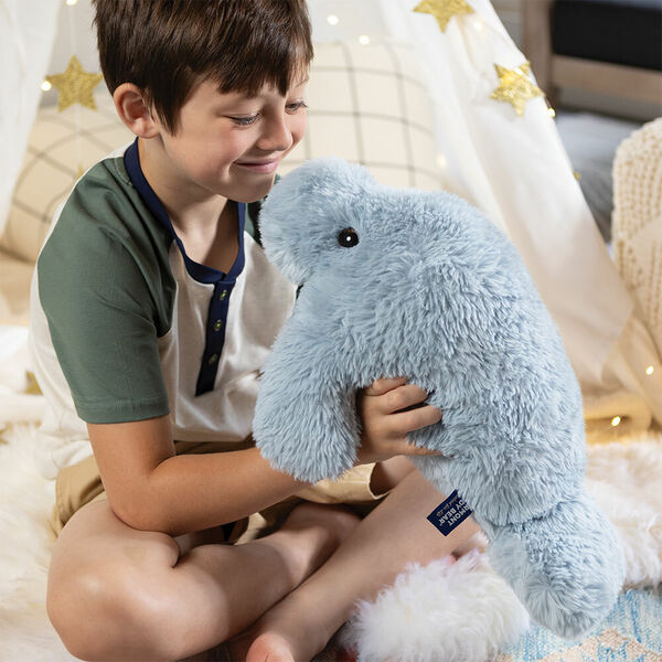 18" Oh So Soft Manatee - side view of grey plush manatee with model