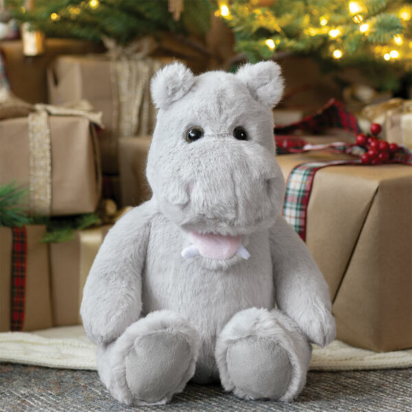 15" Cuddle Chunk Hippo - Grey plush hippo on stack of Christmas gifts