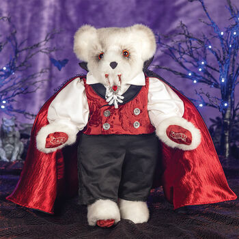 15" Limited Edition Count Dracula Vampire Bear - Standing jointed vanilla bear with fangs and orange eyes dressed in a highly detailed cape, vest, pants and shirt in a Halloween decorative scene