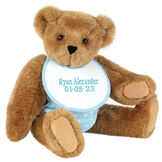 15" Baby Boy Bear - Seated jointed bear dressed in light blue with white dots fabric diaper and bib. Bib is personalized in light blue lettering - Honey brown fur image number 0