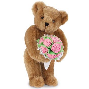15" Pink Rose Bouquet Teddy Bear - Front view of standing jointed bear holding a large pink bouquet wrapped in white satin and lace - Honey brown fur
