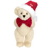 15" Christmas Classic Bear - Standing jointed bear dressed in white red velvet bow tie with red velvet santa hat with white fur trim. Hat is personalized with "Dan" above the fur  - Buttercream brown fur image number 2