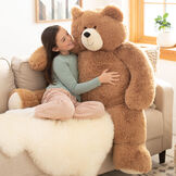 4' Big Hunka Love Bear - Seated golden brown bear with a child on a sofa image number 6