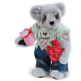 15" Zombie Love Bear - Front view of standing jointed bear with blackened eyes and embroidered scar and red heart tattoo on right arm wearing torn t-shirt and jeans. Bear is holding red heart and pink brain - gray fur image number 0