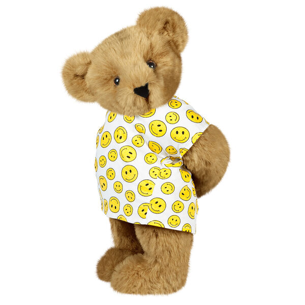 15" Get Well Bear with bandage - Three quarter view of standing jointed bear dressed in a white johnny with yellow happy faces - Honey brown fur image number 0